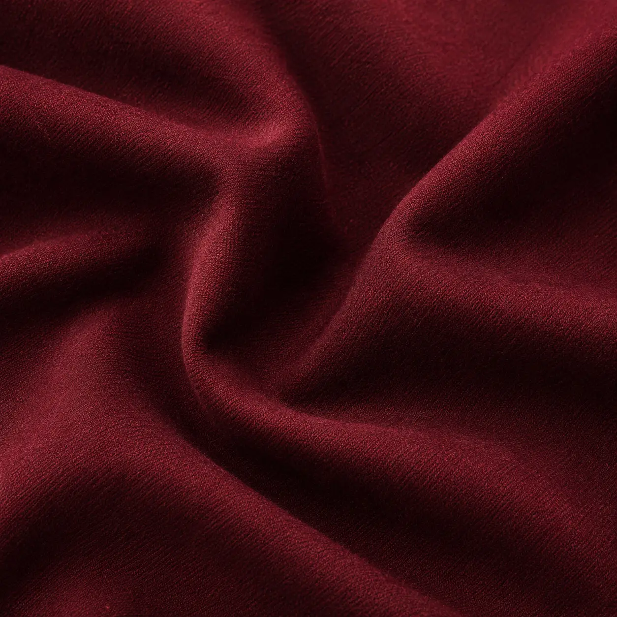 AI Studio close-up macro texture of draped burgundy fabric